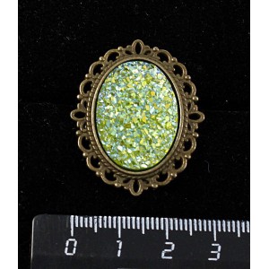 Брошь c кабошоном из пластика "щетка кристаллов", цвет салатовый, овал 25х18мм,  с узором цвет бронза