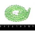 Бусина стеклянная на нитке мелкая грань 8*6 мм цвет светло-зеленый около 40 см/нить