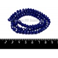 Бусина хрустальная на нити 6*4 мм, цвет непрозрачный индиго около 100 штук/нить