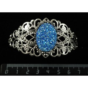 Браслет c кабошоном из пластика "щетка кристаллов",  цвет морская волна, овал 25х18мм, жесткая основа, цвет ант.серебро