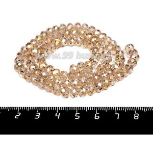 Бусина хрустальная на нити 6*4 мм, цвет золотисто-бежевый/бензин около 100 штук/нить