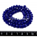 Бусина стеклянная на нитке мелкая грань 8*6 мм цвет непрозрачный кобальт около 40 см/нить
