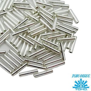 Стеклярус TOHO BUGLE 9 мм № 0021 прозрачный серебристое отверстие 5 граммов Япония