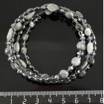 Браслет на струнке кошачий глаз нат. (овалы), гематит (рис), хрусталь, 3-4 оборота