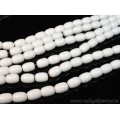 Бусины из агата белого (иск.) бочонок 12*16мм, 39см, 25 бусин