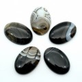 Кабошон из агата глазкового овал, 30*43*9мм.