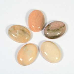 Кабошон из кальцита винного овал 13*18*5мм.