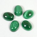 Кабошон из малахита овал 12*16*6мм.