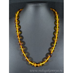 Бусы из янтаря рис 13*19мм медовый, 54см