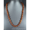 Бусы из янтаря рис 9*13мм коньячный, 54см