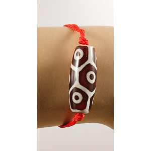 Браслет дзи "9 глаз" на красной нити Браслет дзи "9 глаз" на красной нити