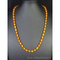 Бусы янтарые рис 6*9мм карамельный, 55см