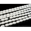 Бусины из агата белого (иск.) бочонок гр.10*14мм, 37,5см, 26 бусин