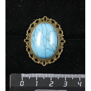 Брошь из бирюзы (иск.), овал 25х18мм, оправа с узором цвет бронза