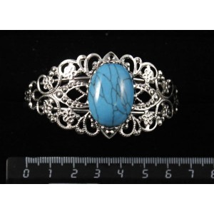 Браслет из бирюзы (иск.), овал 25х18мм, жесткая основа, цвет ант.серебро