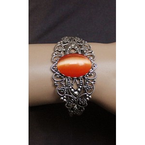 Браслет из кошачьего глаза (синт.), овал 25х18мм, цвет оранжевый, жесткая основа цвет ант. серебро