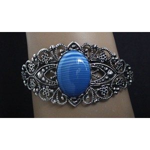 Браслет из агата синего (тонировка), овал 25х18мм, жесткая основа цвет ант.серебро