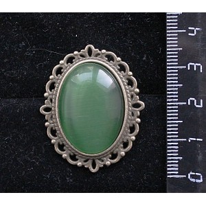 Брошь из кошачьего глаза (синт.), овал 25х18мм, цвет зеленый травяной, оправа с узором цвет бронза