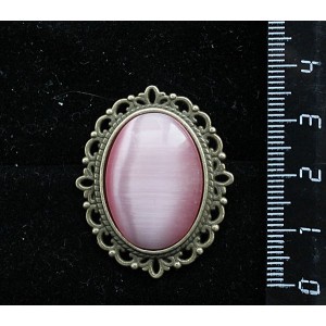 Брошь из кошачьего глаза (синт.), овал 25х18мм, цвет розовый, оправа с узором цвет бронза