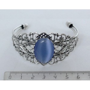 Браслет из кошачьего глаза (синт.), овал 25х18мм, цвет синий лавандовый, жесткая основа, цвет ант.серебро