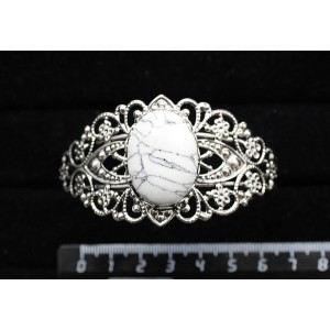 Браслет из каулита, овал 25х18мм, жесткая основа, цвет ант.серебро