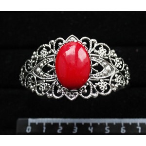 Браслет из коралла красного (иск.), овал 25х18мм, жесткая основа, цвет ант.серебро