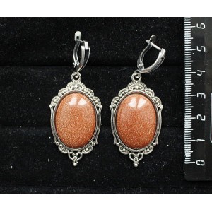 Серьги из авантюрина красного (синт.), овал 25х18мм, оправа "медальон", швензы посеребрение