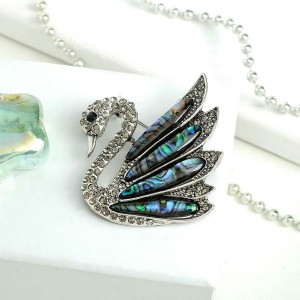 Брошь гелиотис лебедь