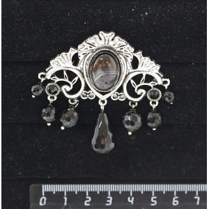 Брошь из  агата черного "трюмо", овал 18х13мм, со стразами и подвесками из черного агата