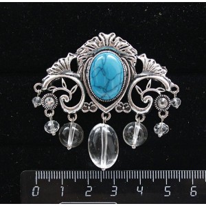 Брошь из бирюзы (иск.) "трюмо", овал 18х13мм, со стразами и подвесками из горного хрусталя