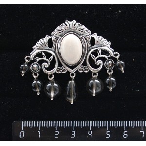 Брошь из кальцита "трюмо", овал 18х13мм, со стразами и подвесками из раухтопаза