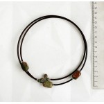 Колье из унакита на струнке, прямоугольник заоваленный 16х12мм + шарики 8мм и 6мм