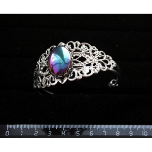 Браслет из гематита с радужным покрытием, овал 25х18мм, жесткая основа, цвет ант.серебро