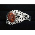 Браслет из янтаря темный, (кабошон-мозаика), овал 25х18мм, жесткая основа, цвет ант.серебро