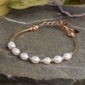 Браслет жемчуг рис через бусинку, цвет белый, цвет золотистый