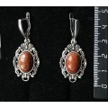 Серьги из авантюрина красного (иск.), основа "принцесса", овал 14х10мм, швензы посеребрение