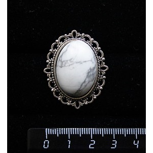 Брошь из каулита, с ажурным контуром,  цвет ант. серебро, овал 25х18мм