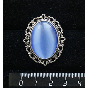 Брошь из кошачьего глаза (синт.), цвет синий лавандовый, с ажурным контуром,  цвет ант. серебро, овал 25х18мм