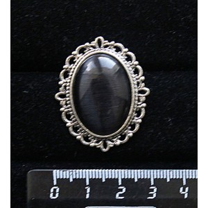 Брошь из кошачьего глаза (синт.), цвет чёрный, с ажурным контуром,  цвет ант. серебро, овал 25х18мм