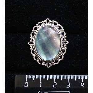 Брошь из флюорита, с ажурным контуром,  цвет ант. серебро, овал 25х18мм