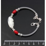 Браслет на струнке из коралла и белого муранского стекла