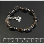 Браслет из раухтопаза, мятый овал 18х11мм, с подвеской