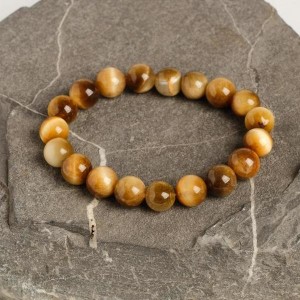 Браслет шар №10 тигровый глаз (гуммигут) Браслет шар №10 тигровый глаз (гуммигут)