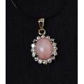 Кулон из коралла (розовый) "овал в цирконах"
