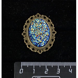 Брошь с кабошоном из пластика "щетка кристаллов", цвет темно-синий, овал 25х18мм, оправа с узором цвет бронза