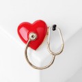 Брошь "Стетоскоп" с сердцем, цветная, цвет золотистый