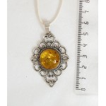 Кулон из янтаря (переплавленый), цвет желтый, круг 18мм, оправа "ромб с узором"