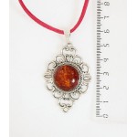 Кулон из янтаря (переплавленый), цвет коньячный, круг 18мм, оправа "ромб с узором"