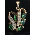 Кулон из циркона зеленого "5 рис волна"