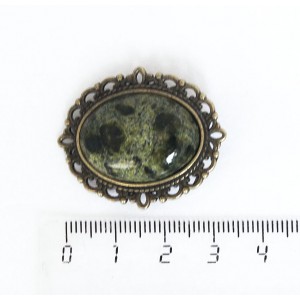 Брошь из змеевика, овал 25х18мм, оправа с узором цвет бронза